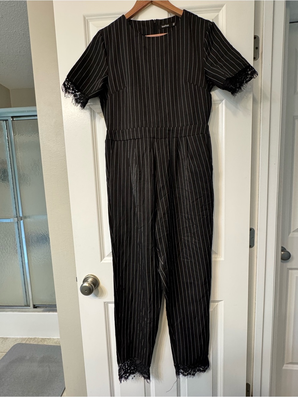 Black Pinstripe Jumpsuit with Lace Trim from London